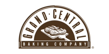 Grand Central Baking Company logo with a drawing of bread on a peel inside an arch with the company name
