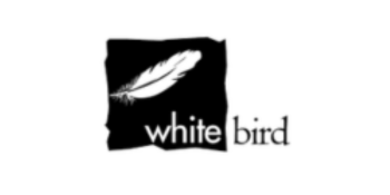 Logo for _white bird_ featuring a stylized white feather on a black background and the words _white bird_ below it