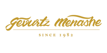 The text _Gewurtz Menashe_ is written in a golden script font, with a thin gold line underneath. Below the line, the text _SINCE 1982_ is written in a simple, all-caps sans-serif font